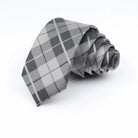 cravate à carreaux, cravate en polyester, accessoire homme élégant, cravate pour occasions spéciales, cravate polyvalente