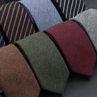 cravate en laine, cravate rayée, accessoire homme élégant, cravate durable, cravate sophistiquée