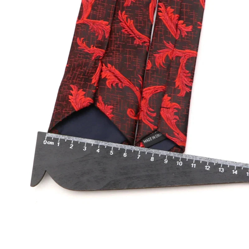 cravate imprimée de luxe, cravate en polyester premium, accessoire homme sophistiqué, cravate motif exclusif, cravate élégante pour homme