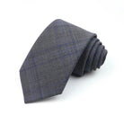 cravate en laine, cravate rayée élégante, accessoire homme durable, cravate de qualité, cravate sophistiquée